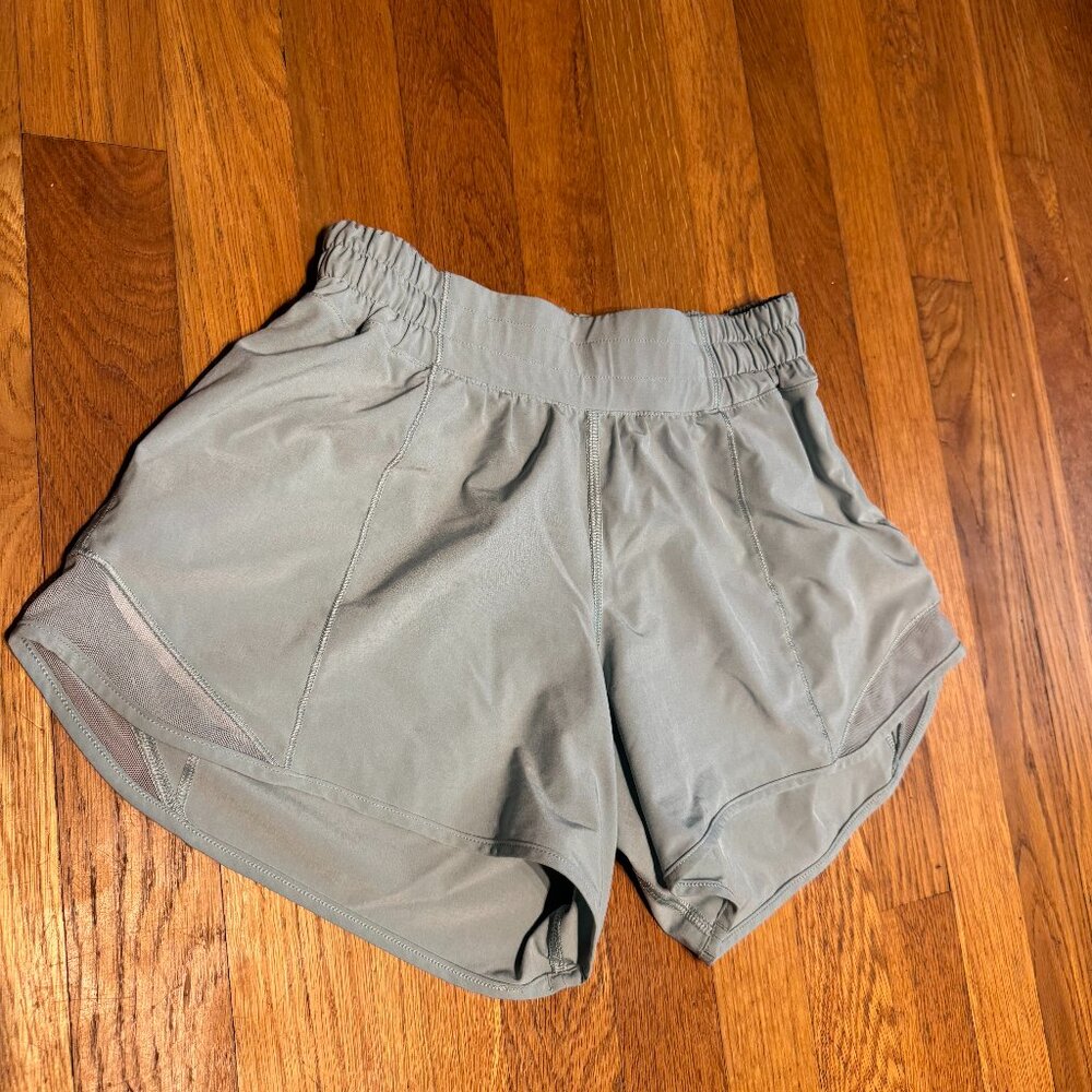 LULULEMON 4inch teal shorts
